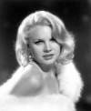 The photo image of Carroll Baker, starring in the movie "The Watcher in the Woods"