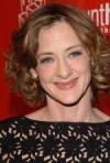 The photo image of Joan Cusack, starring in the movie "It's a Very Merry Muppet Christmas Movie"