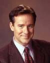 The photo image of Phil Hartman, starring in the movie "So I Married an Axe Murderer"