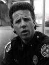 The photo image of Lance Kinsey, starring in the movie "Police Academy 4: Citizens on Patrol"