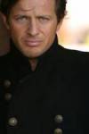 The photo image of Costas Mandylor, starring in the movie "Delta of Venus"