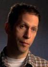 The photo image of Tim Blake Nelson, starring in the movie "Fido"