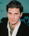 The photo image of David Boreanaz, starring in the movie "Suffering Man's Charity aka Ghost Writer"
