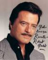 The photo image of Robert Goulet, starring in the movie "Scrooged"
