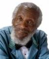 The photo image of Dick Gregory, starring in the movie "Why We Laugh: Black Comedians on Black Comedy"