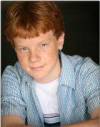 The photo image of Adam Hicks, starring in the movie "The 12 Dogs of Christmas"