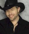 The photo image of Toby Keith, starring in the movie "Broken Bridges"