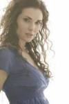 The photo image of Laura Mennell, starring in the movie "Driven to Kill"