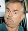 The photo image of John Ratzenberger, starring in the movie "Motel Hell"