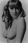 The photo image of Wendy Richard, starring in the movie "On the Buses"