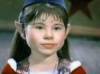 The photo image of Paige Tamada, starring in the movie "The Santa Clause"